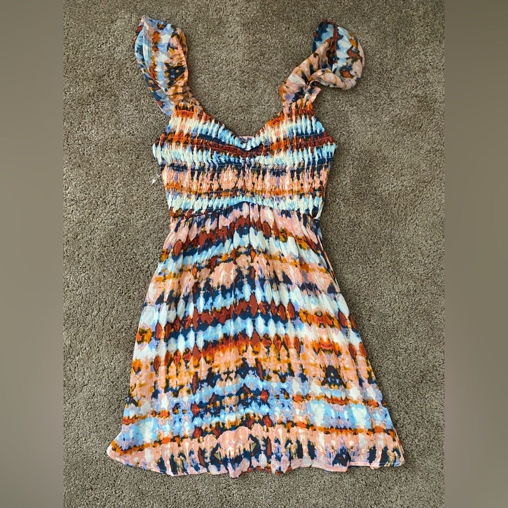 Super cute short flowy dress!
